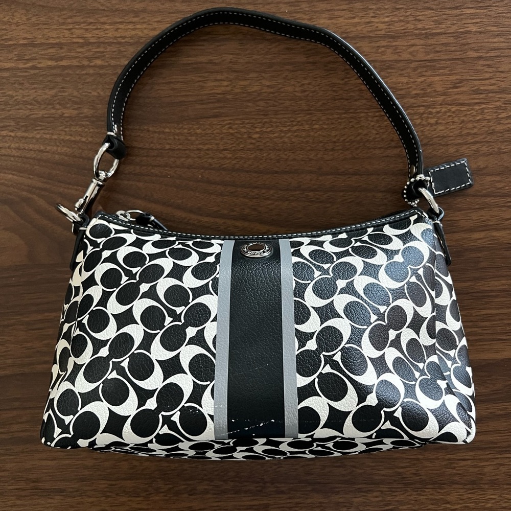 Coach - Mini black body with white C’s.